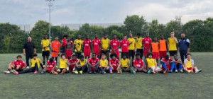 prise de photo de deux équipes de foot